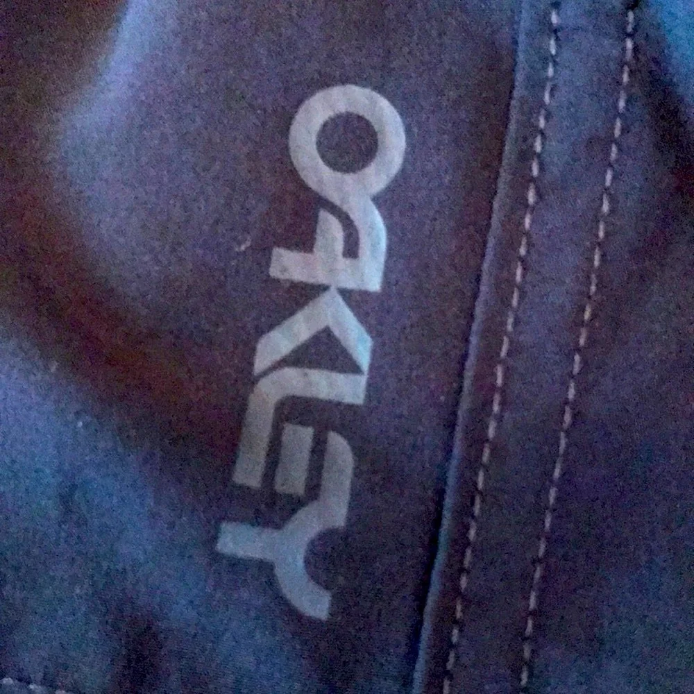 Oakley size 40 black stretch nylon 9.5” hybrid cargo board shorts swim water EUC